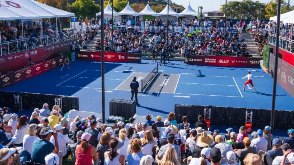 Pickleball tournament crowd and players